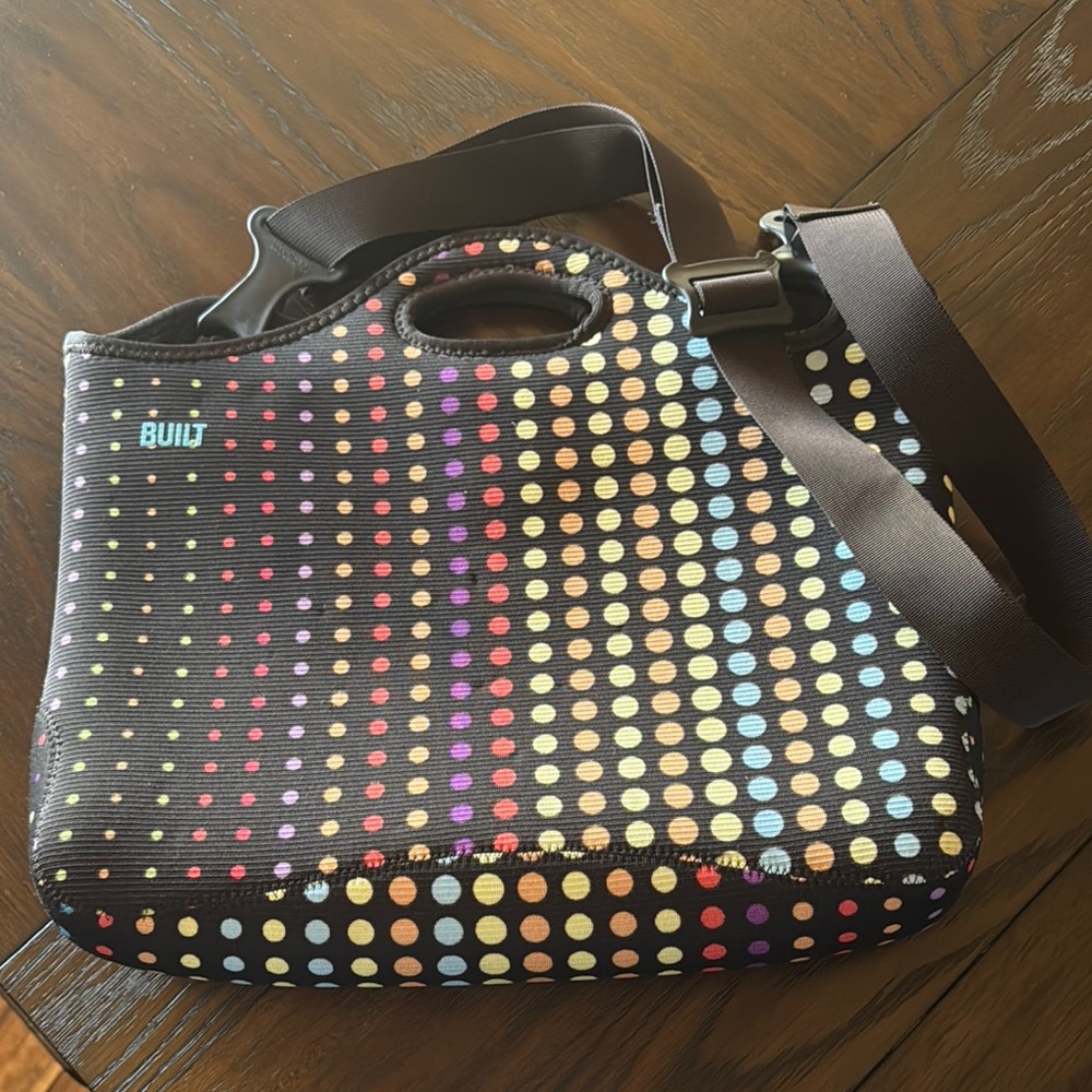 Red and Brown Laptop Bag with Vibrant Polka Dots
